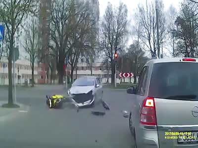 Biker Knocked Flying By Woman Driver