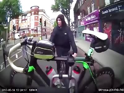 Thief tries to steal bike from moving car