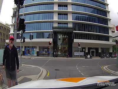 Angry pedestrian gets dose of instant karma, runs into pole