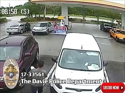 Crooks Drag Woman Through Gas Station Parking Lot During Robbery - Florida