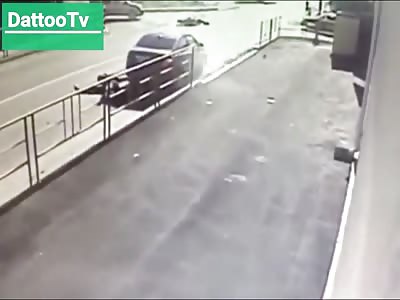 CCTV captures biker hit TWICE within seconds but survives