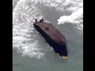 Dramatic footage: US Coast Guard, British Navy rescue family stranded on capsized boat
