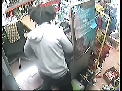 Minnie Mouse-style ear Armed robber threatens staff at gunpoint