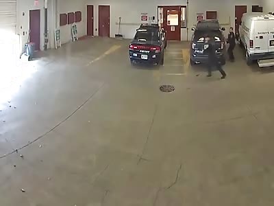 Suspect escapes cops by diving under closing garage door