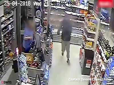 Brave female shop worker fights off armed robber