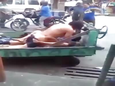 Couple having sex in the cart cheered up by onlookers