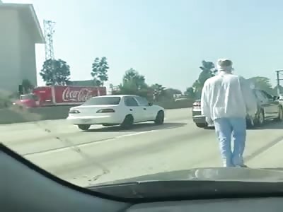 Mentally Ill Man in Bandages Walks on Highway