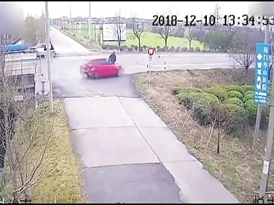 Lucky pedestrian is missed by inches as car hurtles towards him