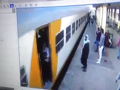 egyptian young woman fall under train