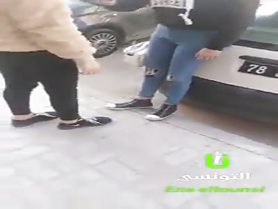 Tunisian girl fighting in the street
