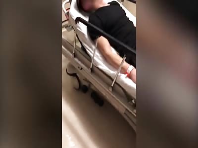 Cop strikes an attempted suicide victim in the hospital