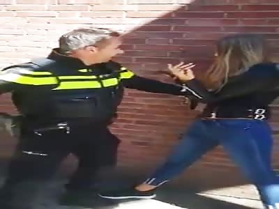 Cop Has a Hard Time Detaining Feisty Pretty Girl.