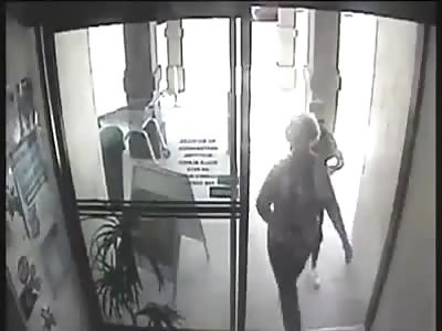 Robber runs into a glass door while escaping