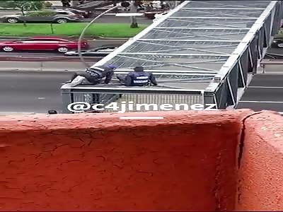 Mexican police saving suicidal man holding flag