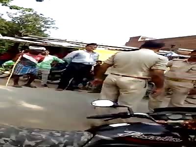 TWO drunk indian policeman beating man in front of his kids