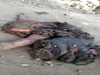 body shattered of Syrian civilian after regime hair strike