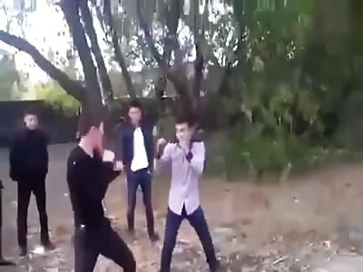 Russian boy convulsing after brutal punch and head kicking 