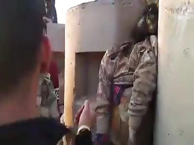 Libyan mercenaries making interviews with dead soldier 