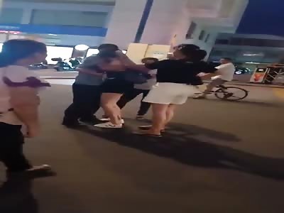 Chinese man try to protect his mistress from his angry wife