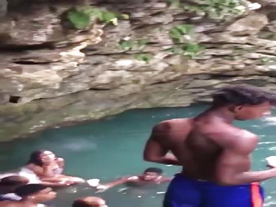 Dominican republic big stone falls directly on head of unlucky young man.