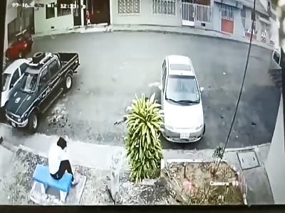 Hitman in Black Executes a Man Sitting in Front of His House. 