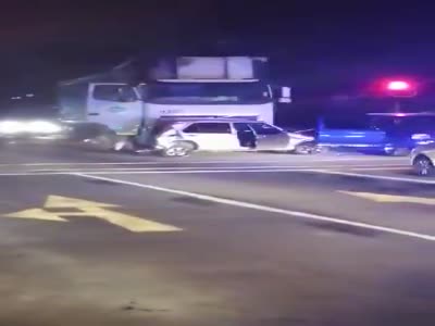 Truck crashes into multiple vehicles.