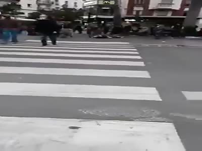 Footage showing police shoot down a man who beheaded a person in broad