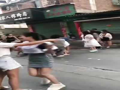 Group of Chinese street prostitutes fighting 