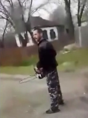 Russian Crazy Man with a Chainsaw gets Hard Beating