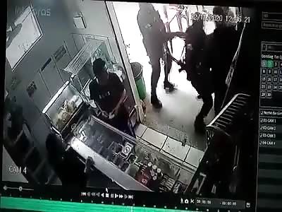 Police beating young man.