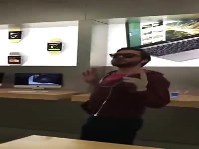 Angry client of apple smashing phone and laptop 