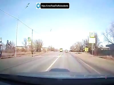 Russian pedestrian crossing street hit by speeding big truck 