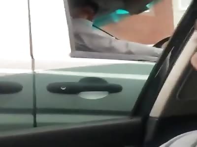 Man Attacks Woman's Car With a Machete.