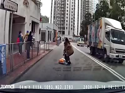 Little kid crossing the street get hit by speeding car 