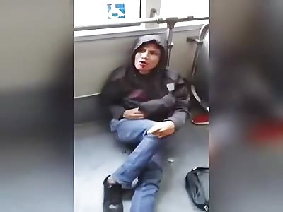 Thief trapped in bus gets his ass beaten.