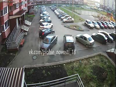 CCTV VIDEO CAPTURES YOUNG MAN SUICIDE LANDING IN RUSSIA  