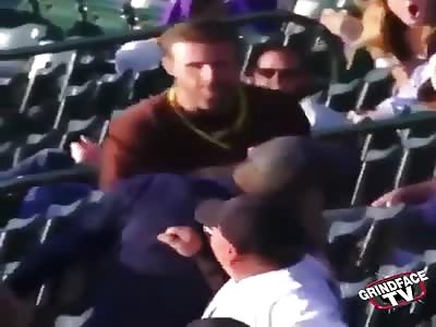 Padres fan knocks a Rockies fan out cold and gets mobbed by Rockies fan