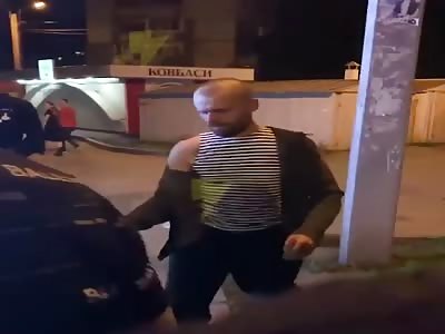 Drunk Russian throwing grenade in middle of crowd after gets punched 