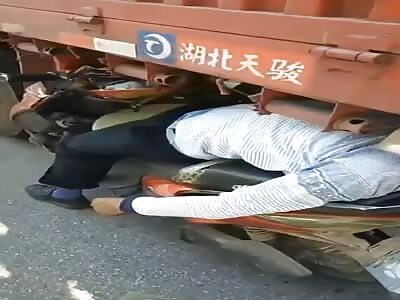 Old man crashed dead and stuck on the back of big truck 