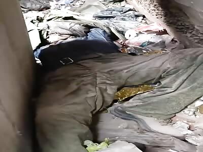 Dead Russian soldier under collapsed house 