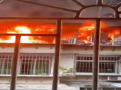 Chinese couple burned alive trapped by iron window and flame 