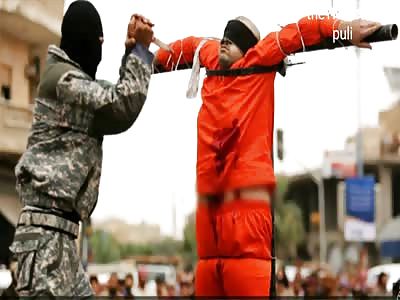 ISIS Pierces 'Spy' With Knife Before Public Crucifixion In Syria