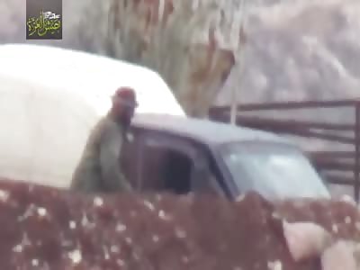 Rebels sniping Assad forces in Northern Hama.