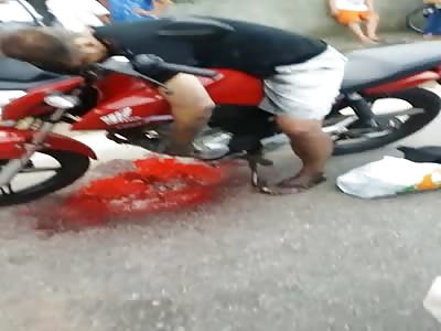 MAN EXECUTED ON HIS MOTORCYCLE