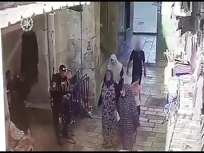 The video shows a moment when an Arab-Israeli man makes a stabbing att