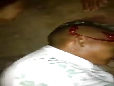 young man killed with a shot in the head Brazil