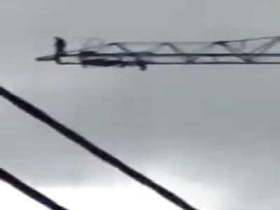 Man Takes His Life... Tries Flying off a Crane