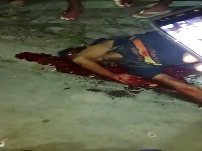 Man in Pure Agony Rolls around on the Street Spewing Blood