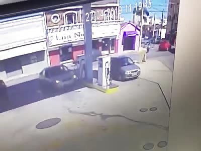 Man being executed in gas station
