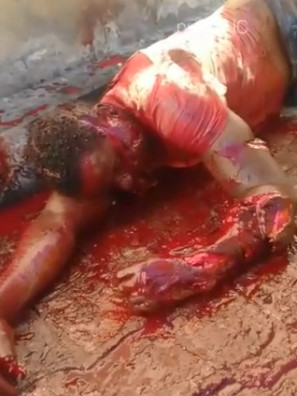 Damn!! Man Hacked Apart with Dangling Severed Arm and Gouges Head in his Head rolls around in the Dirt 
